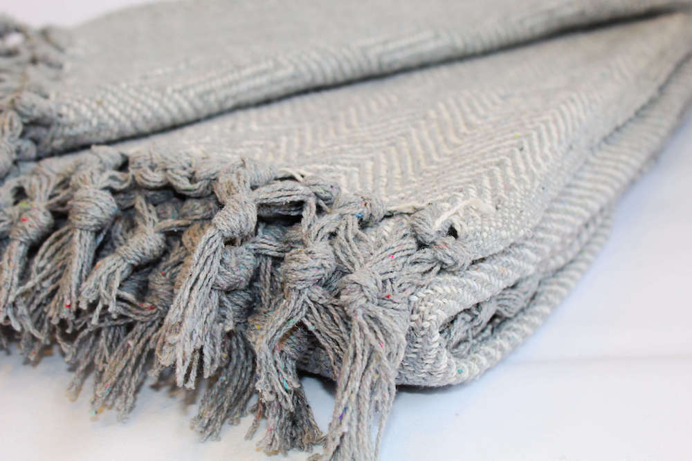 Home interior blanket by Cross-Stitch Interiors